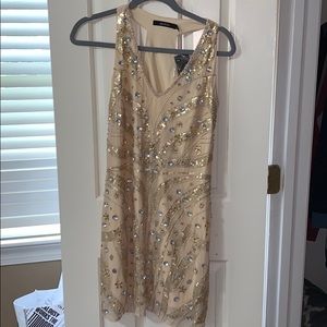 Razor back gold dress